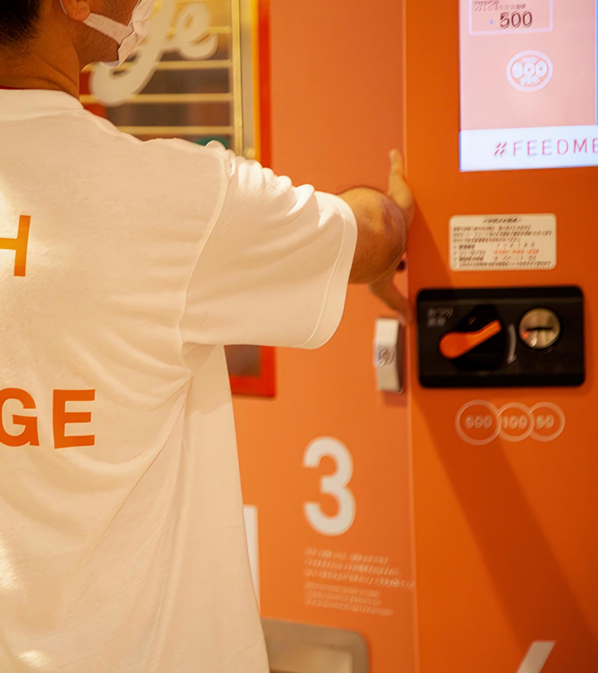 Feed ME Orange vending machine picture